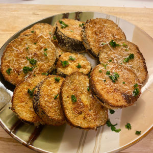 Plate with crispy baked breaded Eggplant