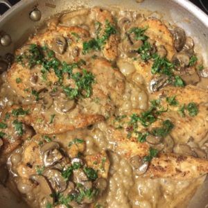 A frying-pan with chicken breast in a delicious Creamy Marsala sauce