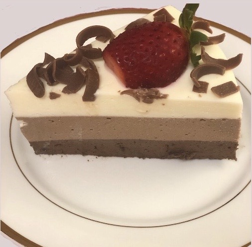 a plate with piece of triple layer chocolate mousse recipe