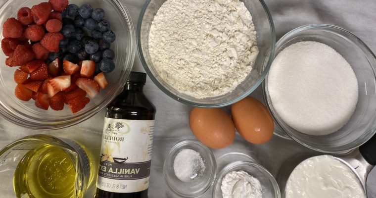 Simple- and-easy-triple-berry-Muffins-ingredients- flour-baking -powder-berries-salt- vanilla, eggs, oil-sugar-and-greek yogurt to bake Fluffy Triple-Berry muffins recipe ingredients